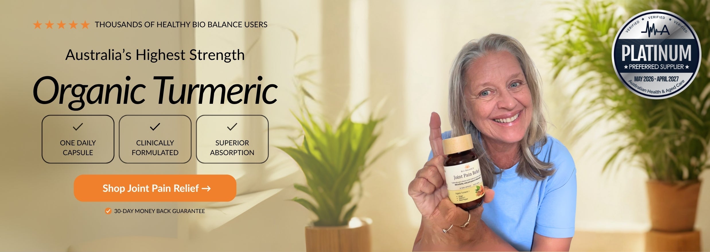 Woman holding a jar of organic turmeric with a promotional banner in the background