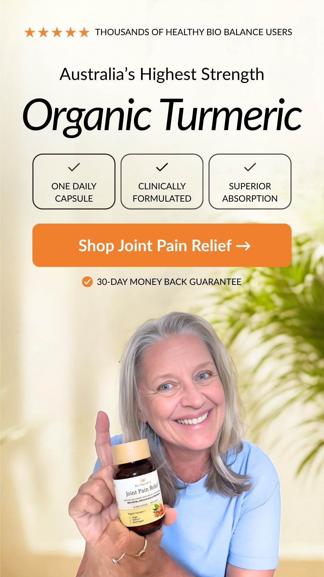 Woman holding a bottle of Organic Turmeric with promotional text about its benefits and a call to action to shop joint pain relief.