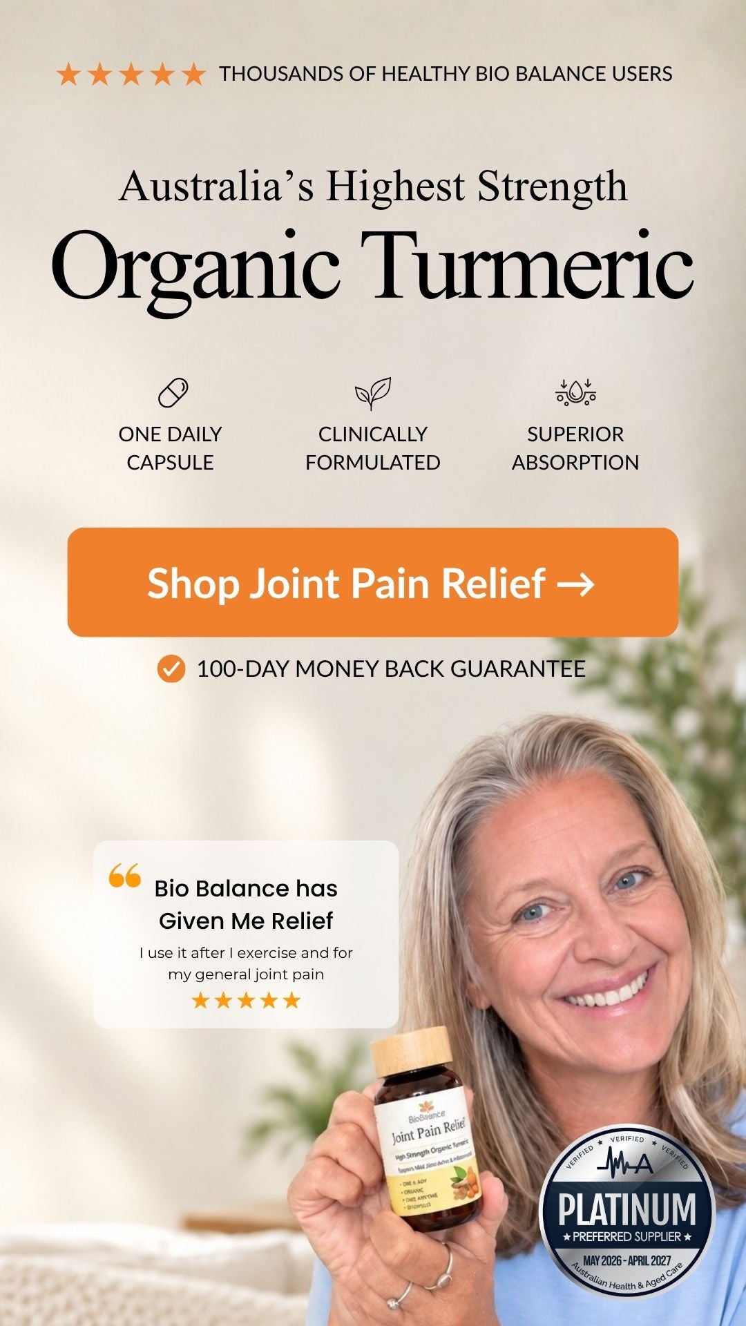 Promotional graphic for a bottle of organic turmeric joint pain relief capsules, featuring a smiling woman holding the bottle in the lower right. The design includes text highlighting 'Australia's Highest Strength Organic Turmeric', 'One Daily Capsule', 'Clinically Formulated', 'Superior Absorption', and a '100-Day Money Back Guarantee'.